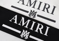 Amiri MA Bar Logo Hoodie – Logo close-up Black and White side by side