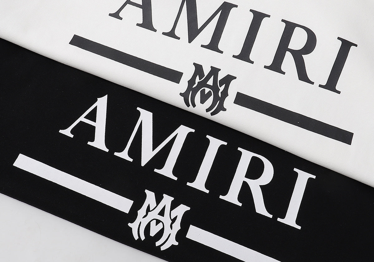 Amiri MA Bar Logo Hoodie – Logo close-up Black and White side by side