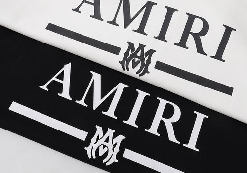 Amiri MA Bar Logo Hoodie – Logo close-up Black and White side by side