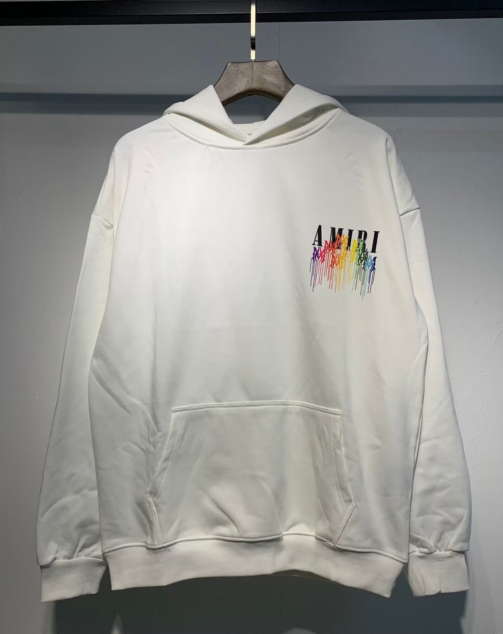Amiri Rainbow Paint Drip Hoodie – Cream back view with full rainbow monogram