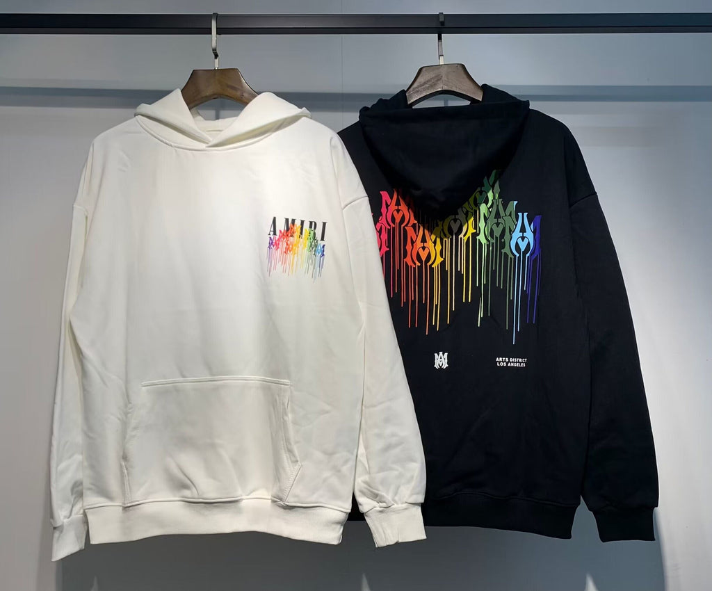 Amiri Rainbow Paint Drip Hoodie – Cream and Black front side by side