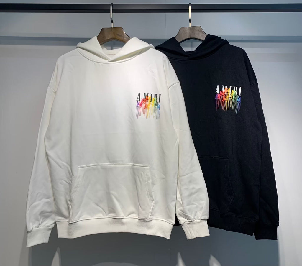 Amiri Rainbow Paint Drip Hoodie – Cream and Black front chest logo detail