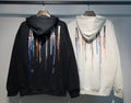 Amiri Paint Drip Hoodie – Back view Black and Cream side by side