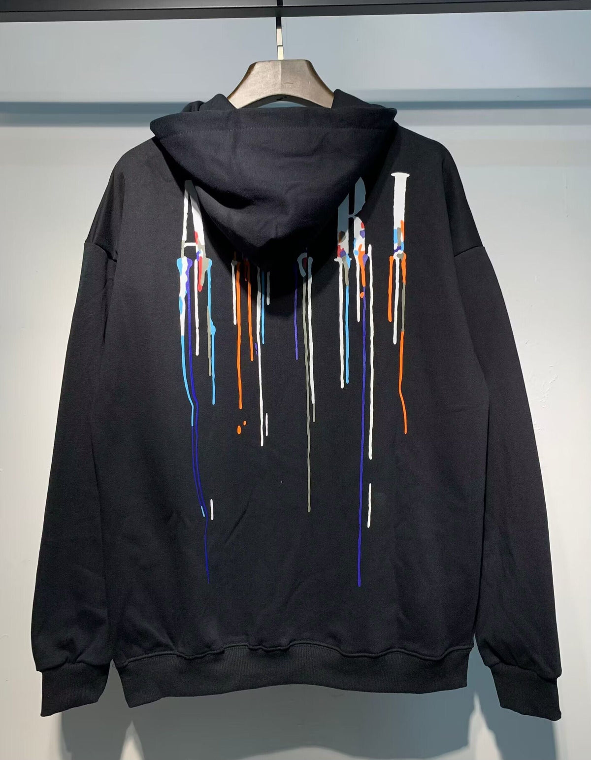 Amiri Paint Drip Hoodie – Black front solo view