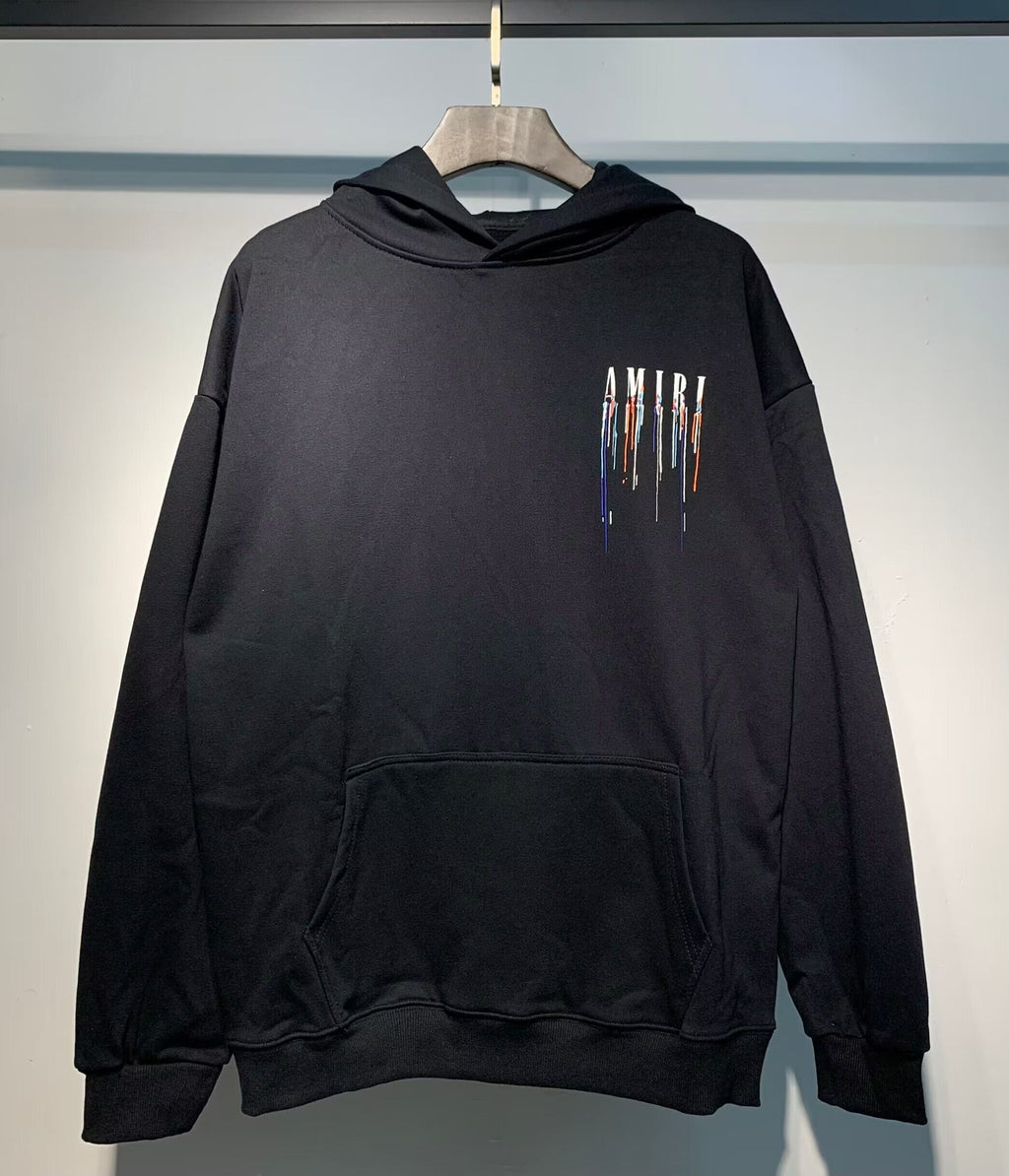 Amiri Paint Drip Hoodie – Black and Cream front logo close-up