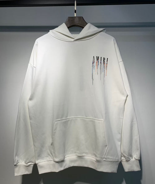 Amiri Paint Drip Hoodie – Front view Black and Cream side by side