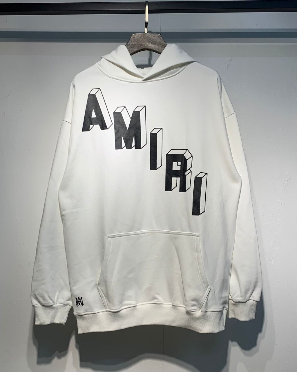 Amiri 3D Logo Hoodie – Black and White side by side back view