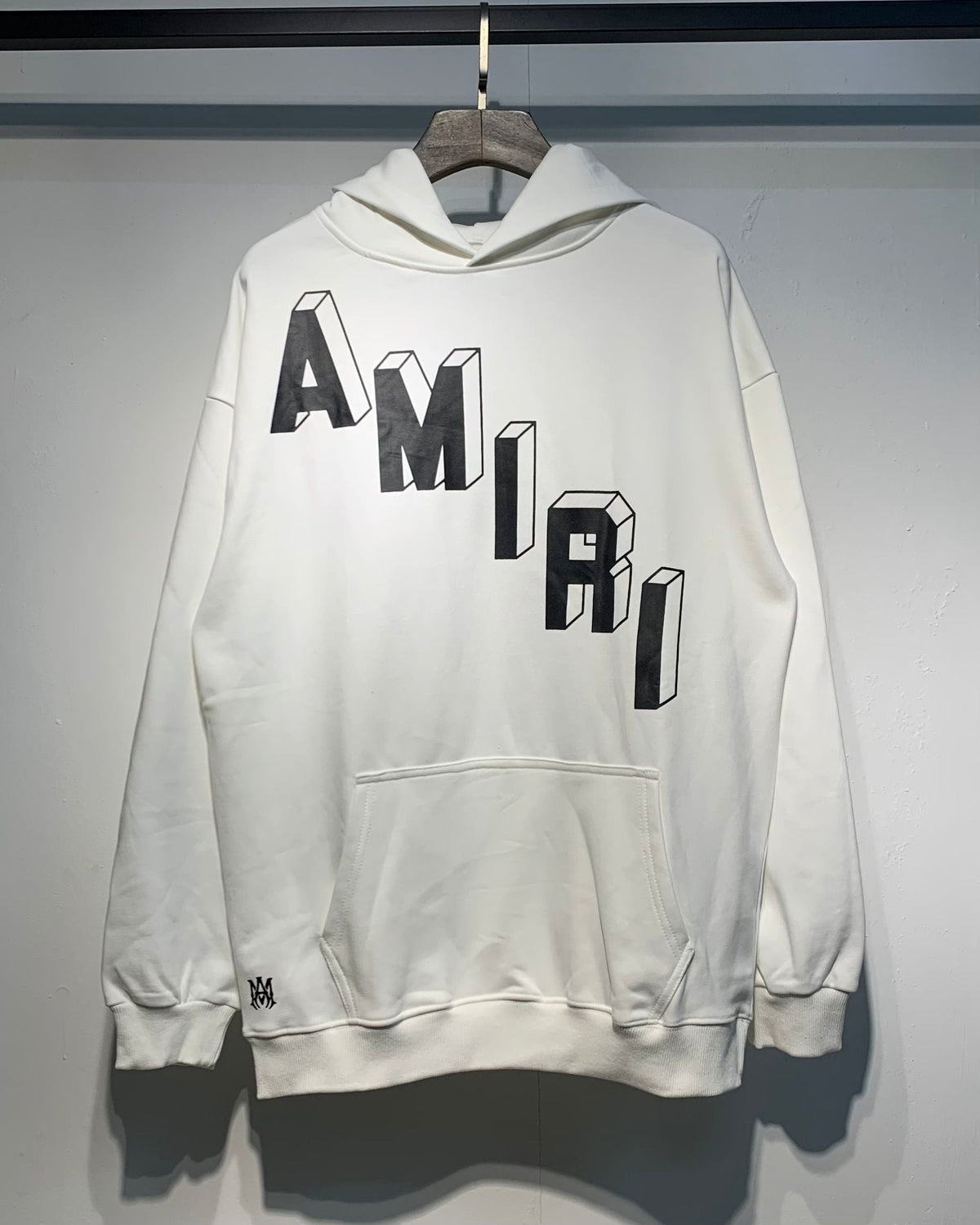 Amiri 3D Logo Hoodie – Black and White side by side back view