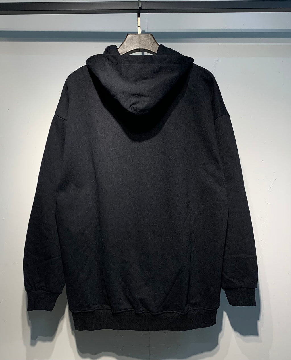 Amiri 3D Logo Hoodie – Black front view with 3D logo