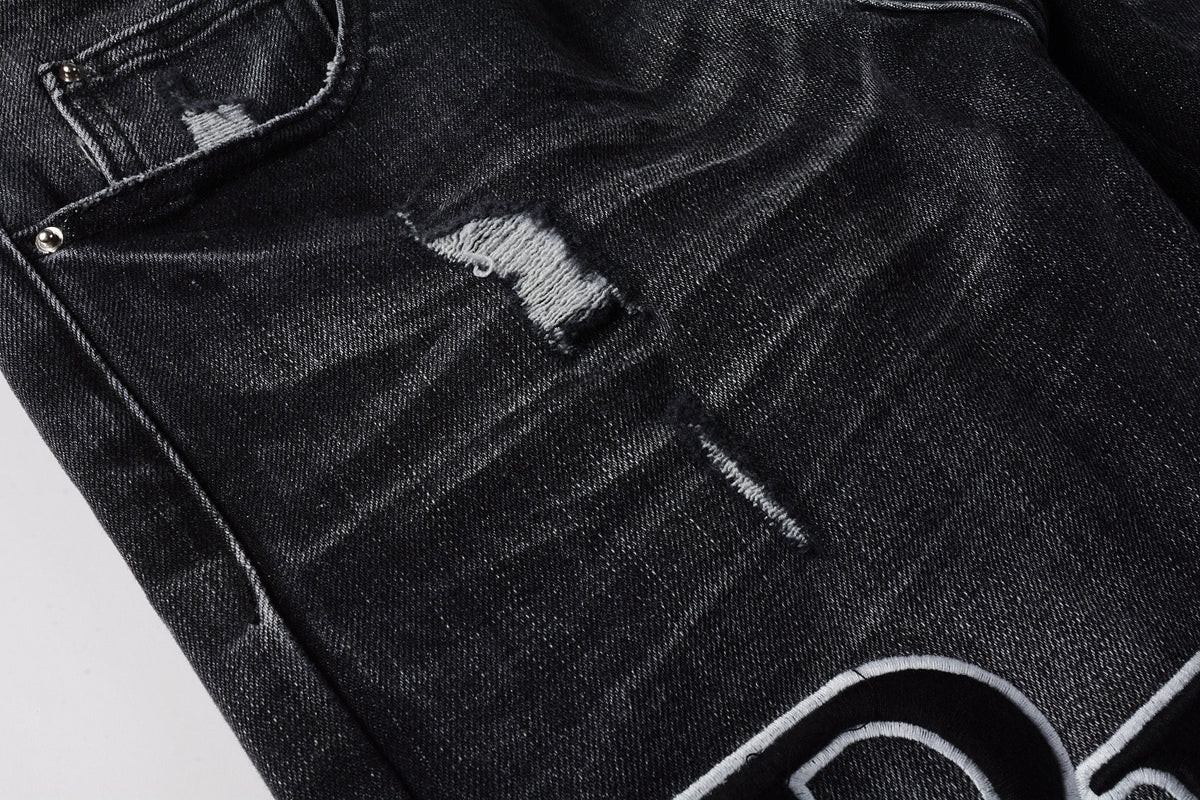 Amiri RH Monogram Distressed Jeans