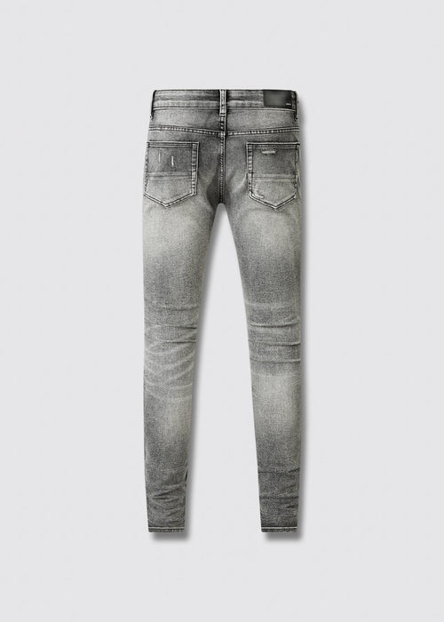 AMIRI MX1 Grey Jeans – Knee distressing detail