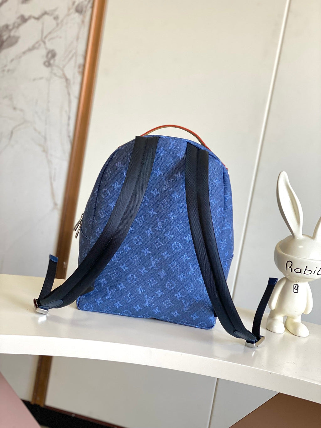 Louis Vuitton Discovery Backpack PM - Side view