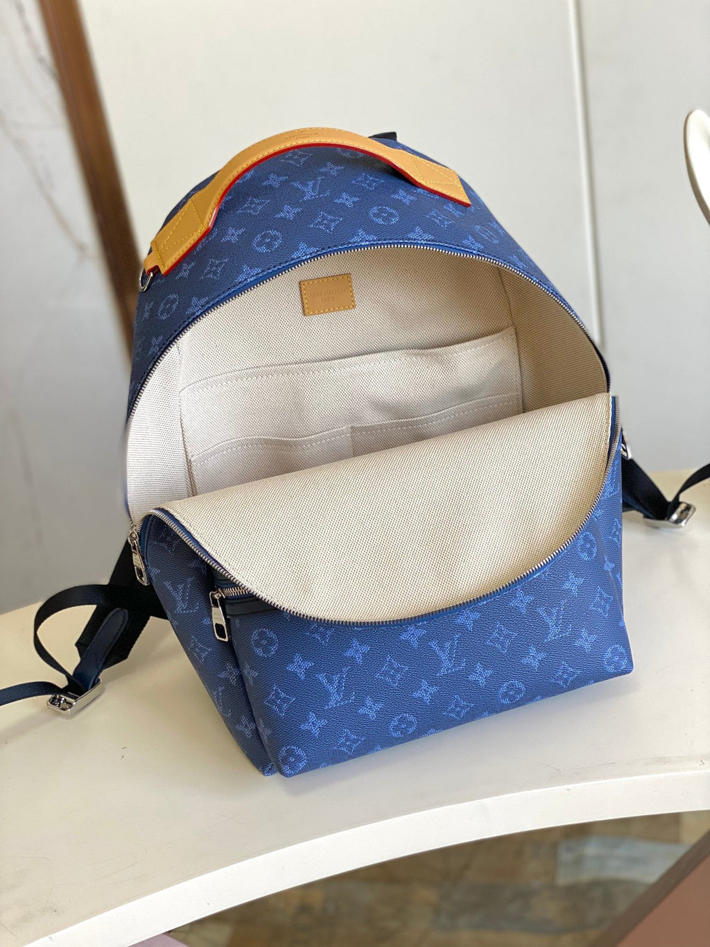 Louis Vuitton Discovery Backpack PM - Bottom view