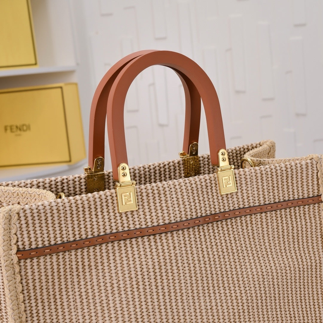 Fendi Sunshine Medium Tote - Interior view with brown leather lining and dust bag