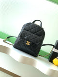 Chanel mini backpack gold ring buckle detail on black caviar leather