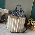Louis Vuitton Speedy Bandoulière navy denim jacquard – full front view on display