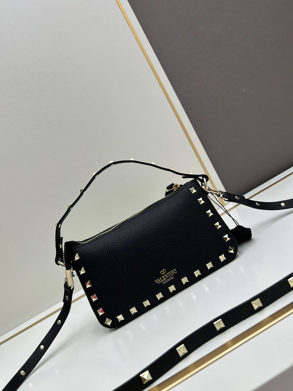Valentino Garavani Rockstud mini bag – bottom view showing stud border