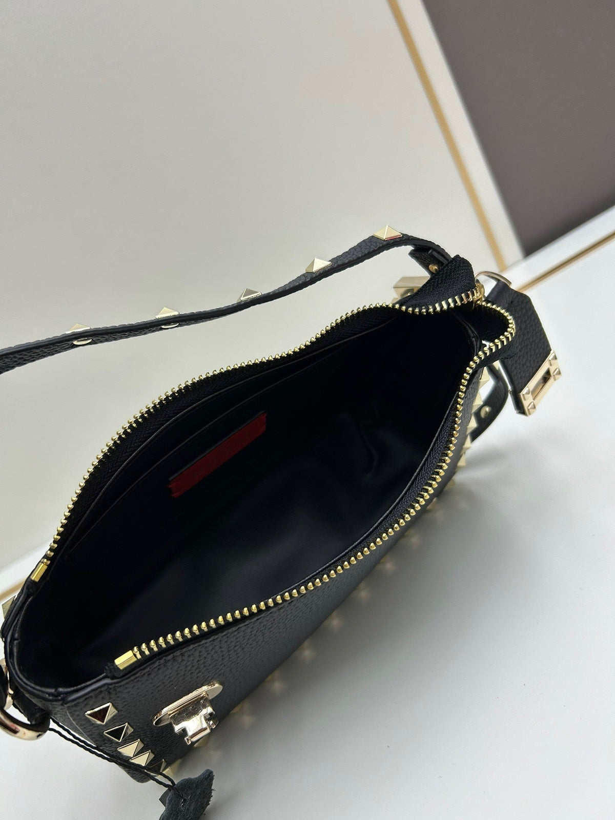 Valentino Garavani Rockstud mini bag – top handle detail with round studs