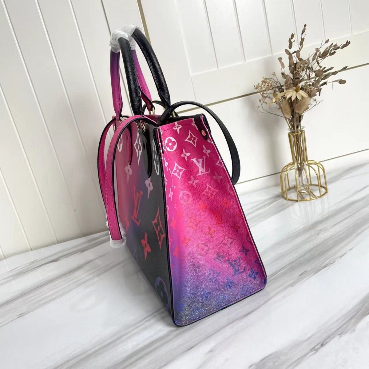 LV OnTheGo MM Midnight Fuchsia - front full view