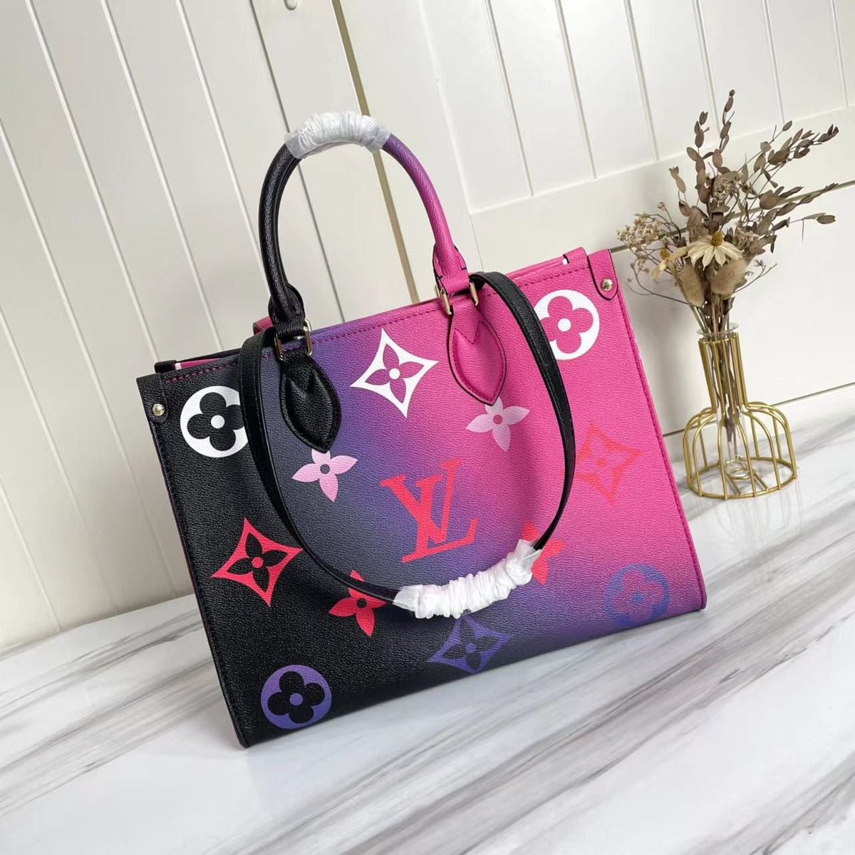 LV OnTheGo MM Midnight Fuchsia - opposite angle view