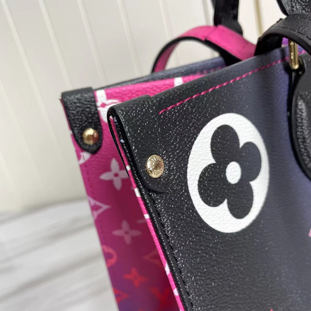 LV OnTheGo MM Midnight Fuchsia - back angle view