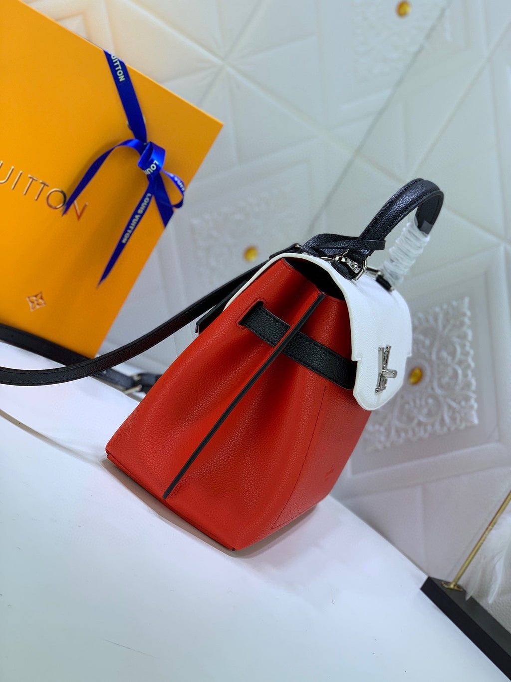 LV Lockme Ever BB - side view showing red body