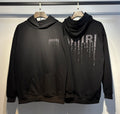 Amiri Crystal Drip Hoodie – front and back view in black with rhinestone logo