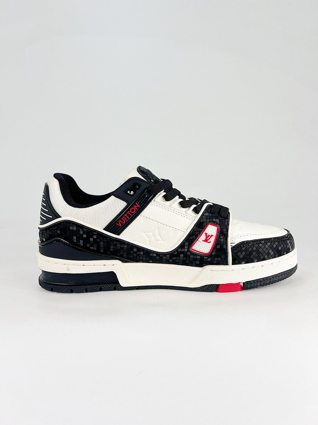LV Trainer #54 Black White CNY – outsole view showing red VUITTON branding