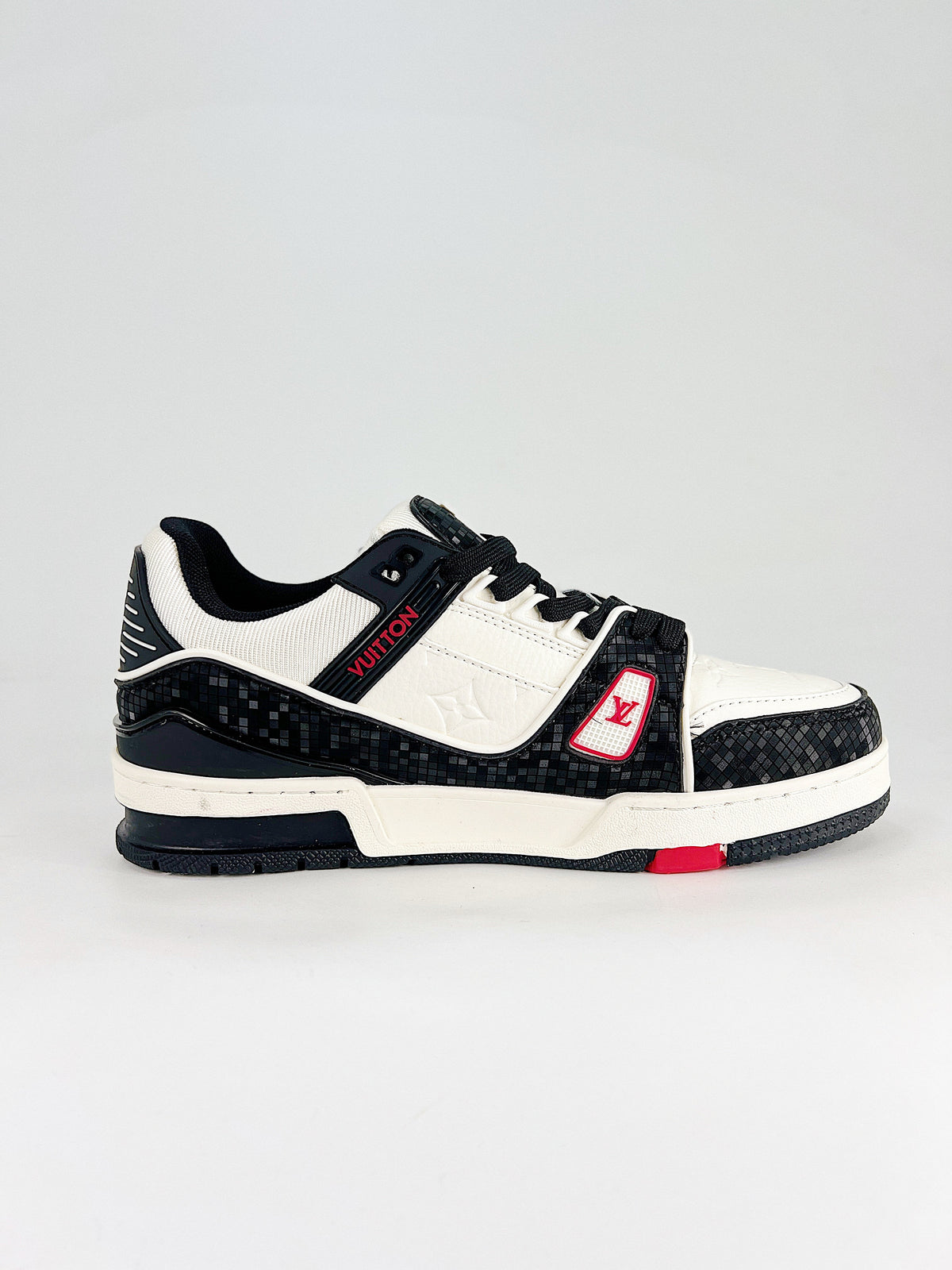 LV Trainer #54 Black White CNY – outsole view showing red VUITTON branding